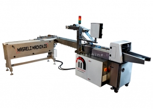 Packaging machine with 90 feeders